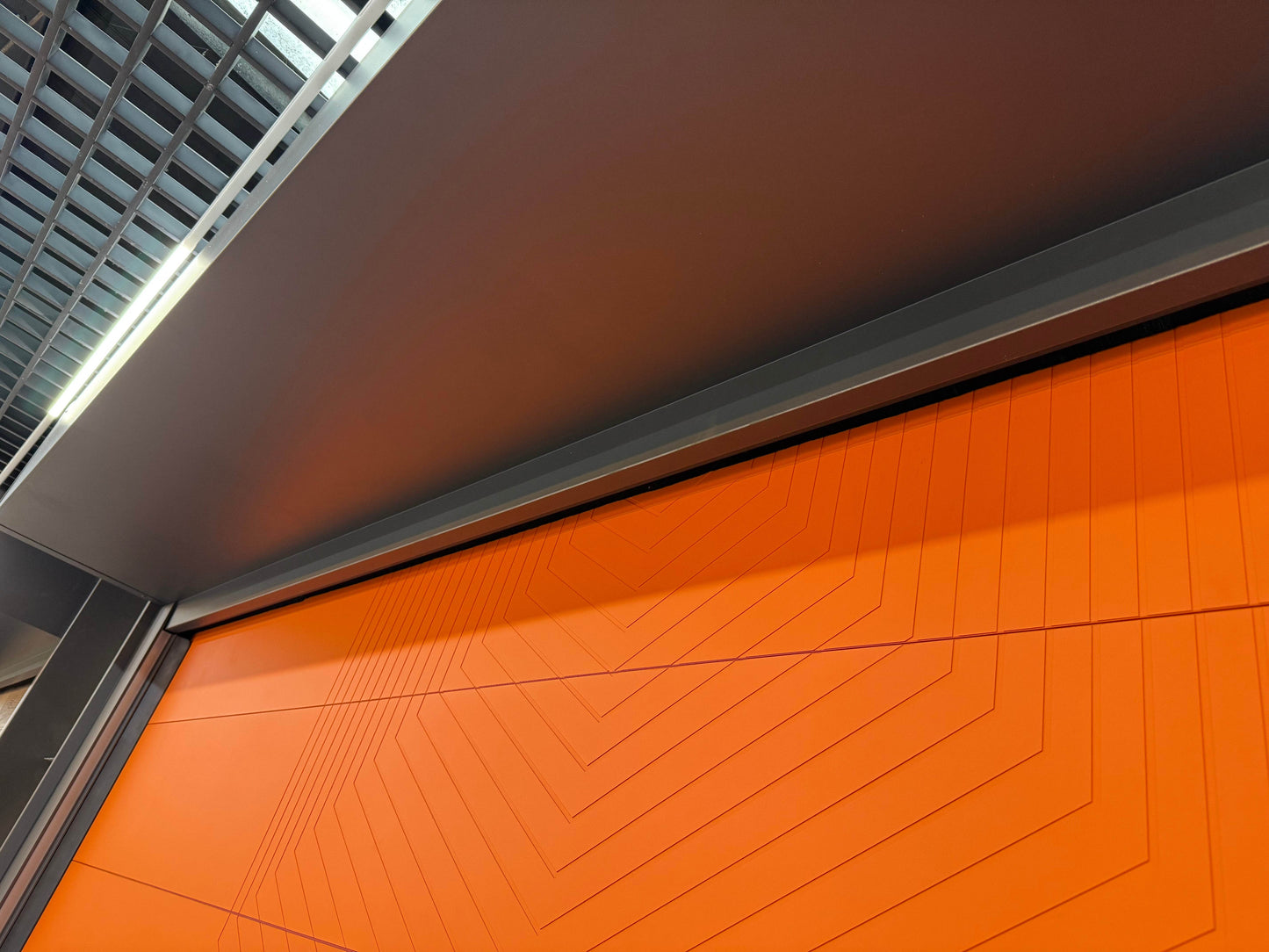 Bold Orange Rolling Garage Door with Modern Geometric Design - BOLANG DOOR