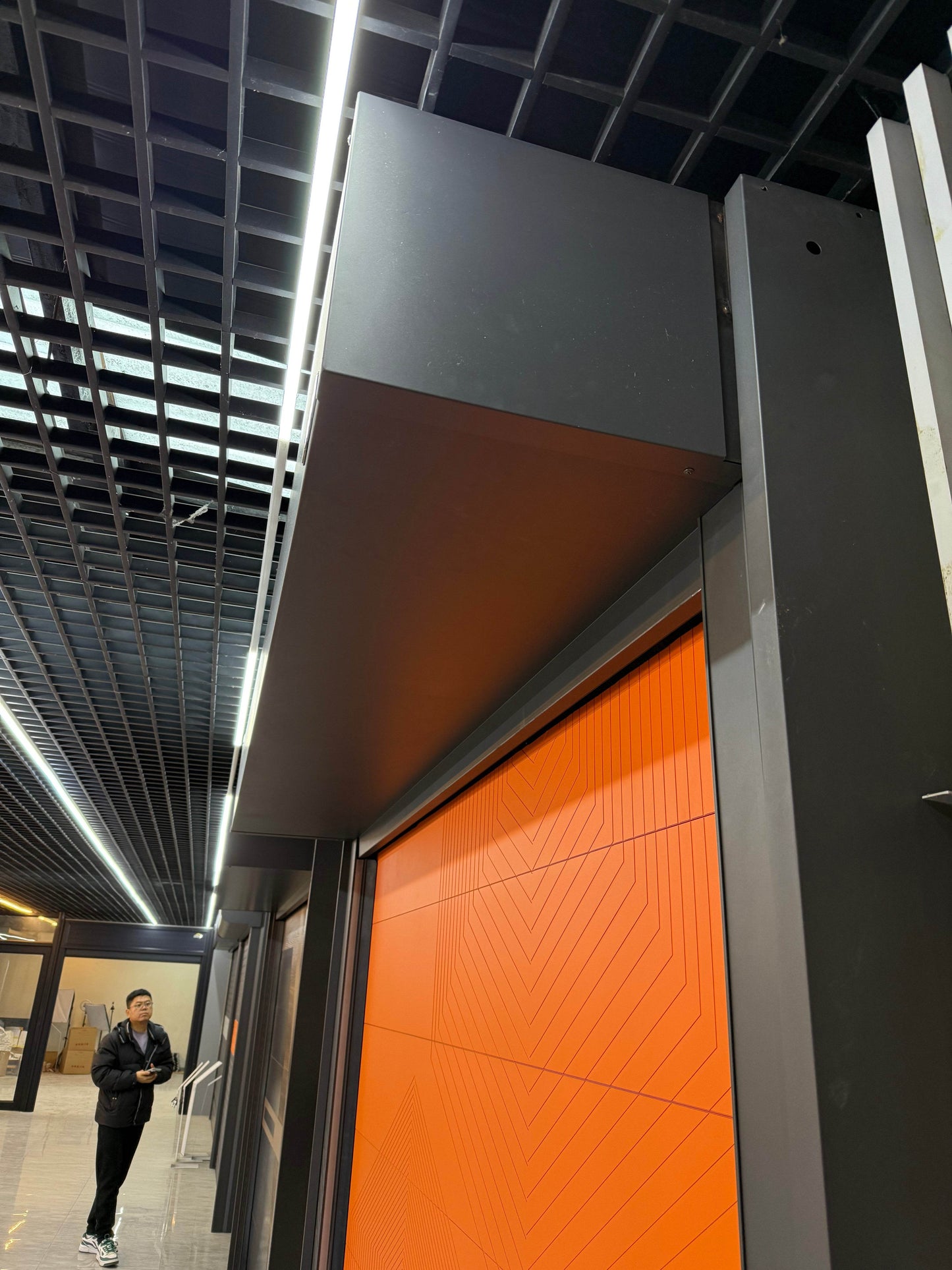 Bold Orange Rolling Garage Door with Modern Geometric Design - BOLANG DOOR