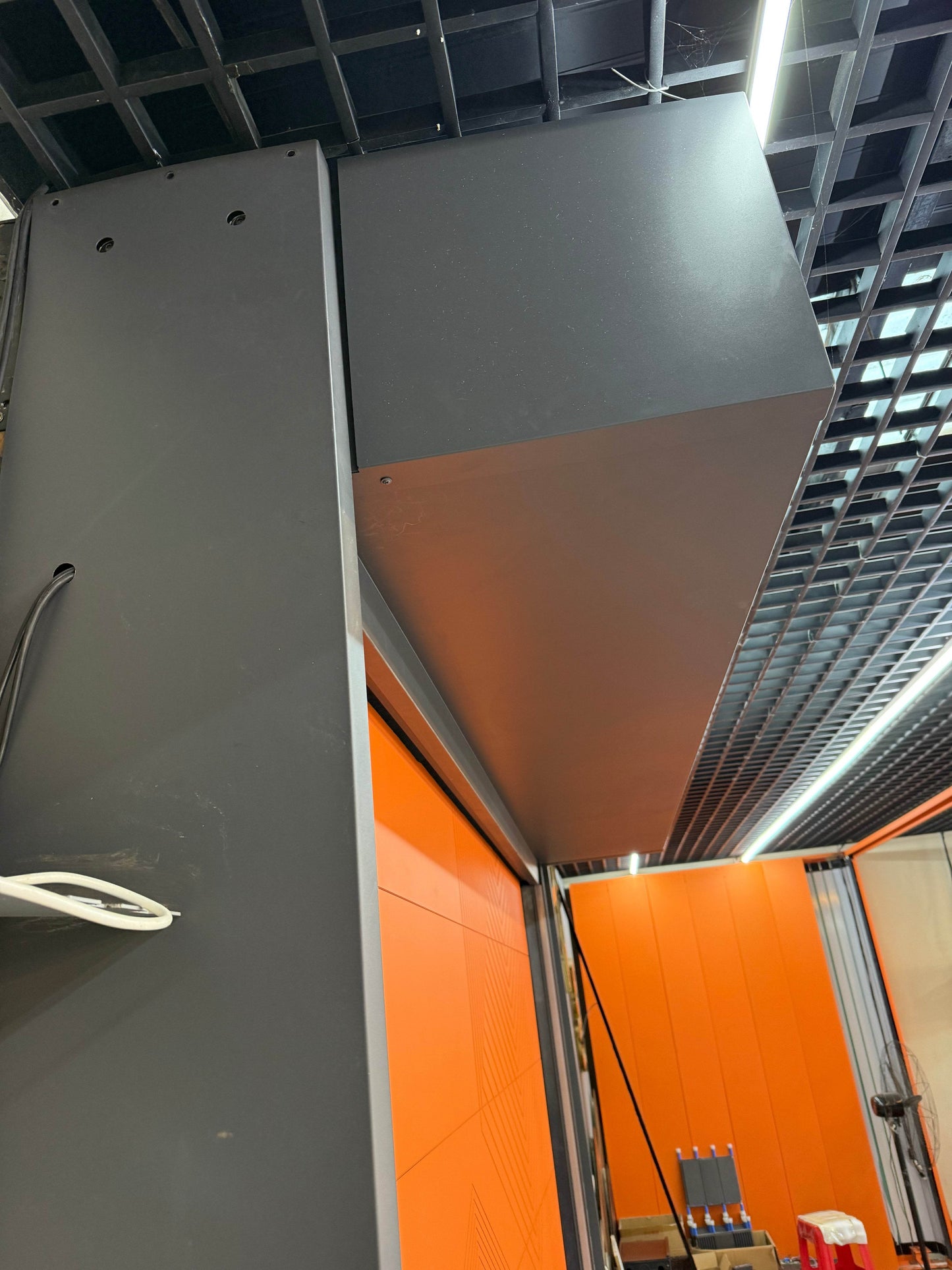 Bold Orange Rolling Garage Door with Modern Geometric Design - BOLANG DOOR