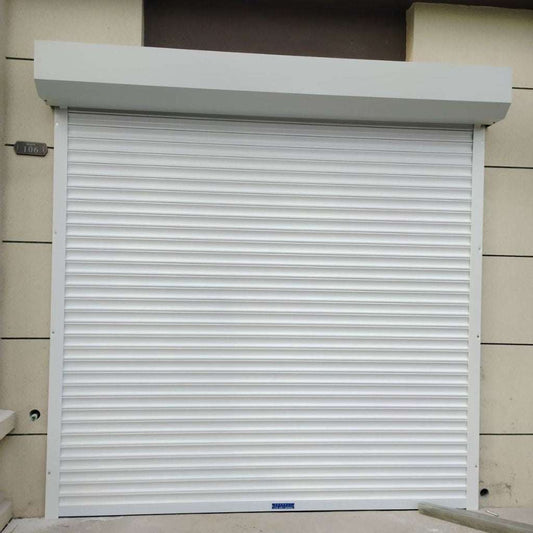 White roller shutter on a building facade